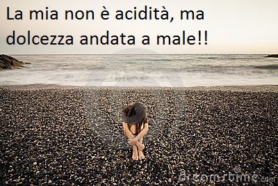 donna-triste-sulla-spiaggia-5937189.jpg