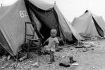 http://static.panorama.it/wp-content/uploads/2012/06/1968-Un-bambino-nella-tendopoli-di-Camporeale.jpg